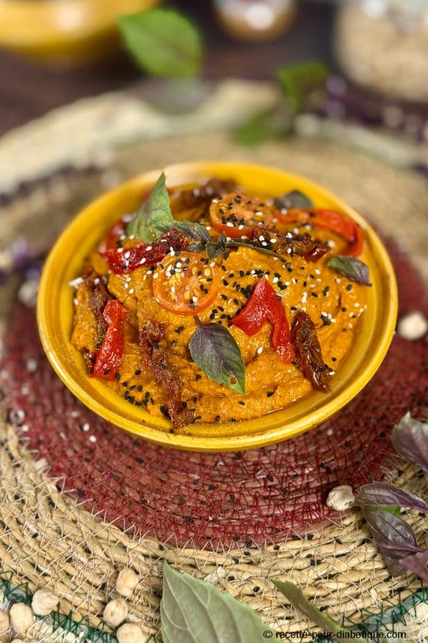 houmous rouge au poivron , tomates séchées et basilic pourpre